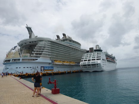 If you want to get an idea of the scale of the ship, here it is next to RCI Empress of the Seas. No idea who those people are.