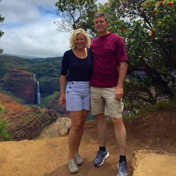 Here are the honeymooners in Kaui. Just look at that waterfall in the canyo