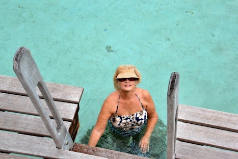 Here i am climbing down the ladder from our bungalow into the warm shallow lagoon