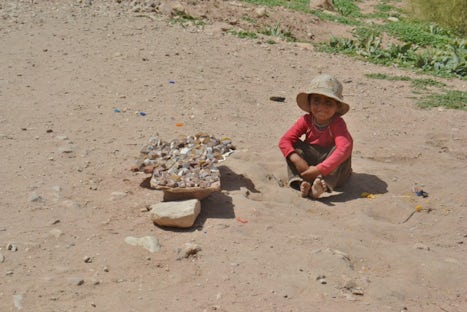 Child selling shells in Petra