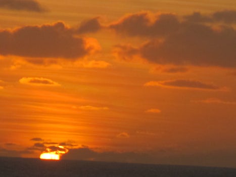 Off deck 8 top side. Beautiful Polynesian sun set!!