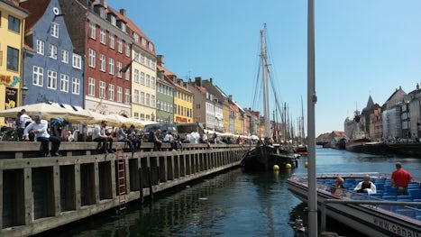 Copenhagan. Take a pleasure boat 'hop on off' to view the city
