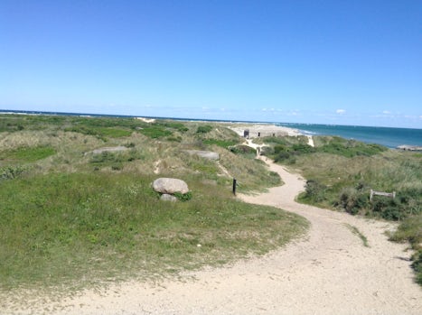 Skagan. Walk along beach to Grenen the famous tip of Denmark where the North sea and Baltic meet.