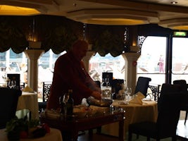 Yacht Club dedicated restaurant La Palmeraie showing Luigi the maitre d&#39