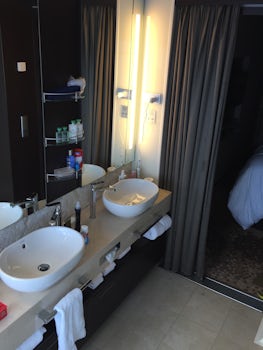 View from inside the bathroom of the two sinks. The bathroom is large