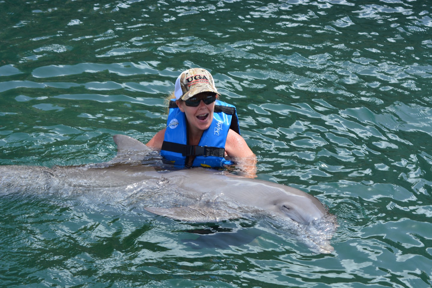 Hugging a dolphin in St Kitts