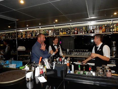 My husband dancing behind the bar with Sarah and Eddie.