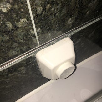 Flush button in our cabin toilet - cracked
