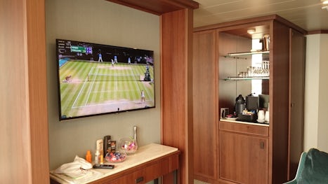 One of the TV's and Drinks area in Suite on P&O's Britannia