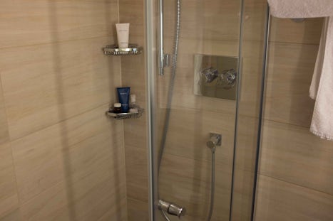 Very nice shower room with two wide folding shower doors.  Power shower.