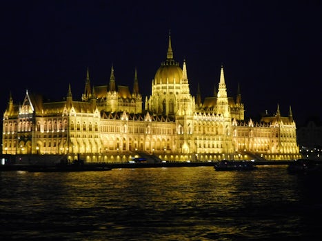 Hungarian Parliament Building at night on the Danube.