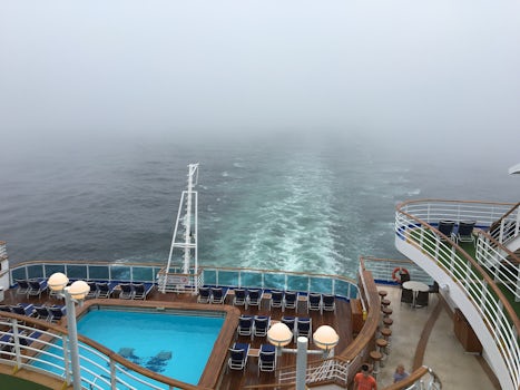 View out the back of ship into the fog.