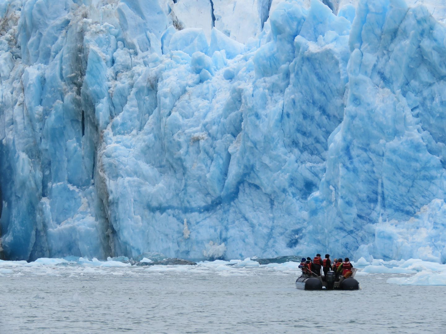 Riding a zodiac boat up to a glacier in Glacier Bay