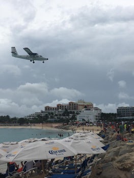 A plane landing over Maho beach.