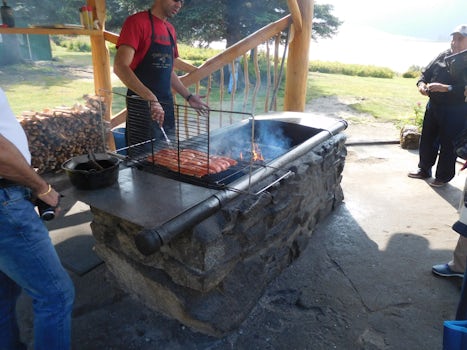 Cooking delicious salmon at Taku Lodge.