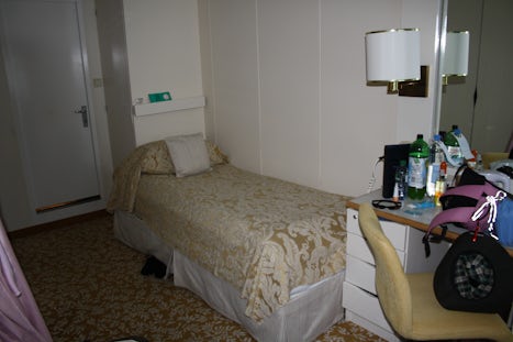 Cabin (daywear on bed)from the window bed, there is a table and chair to th