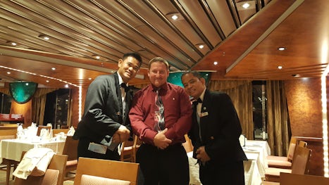 from left to right.. Khemchai, my husband, Danilo in the Imagination Dining