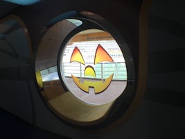 Halloween decorations in all public portholes throughout the ship.