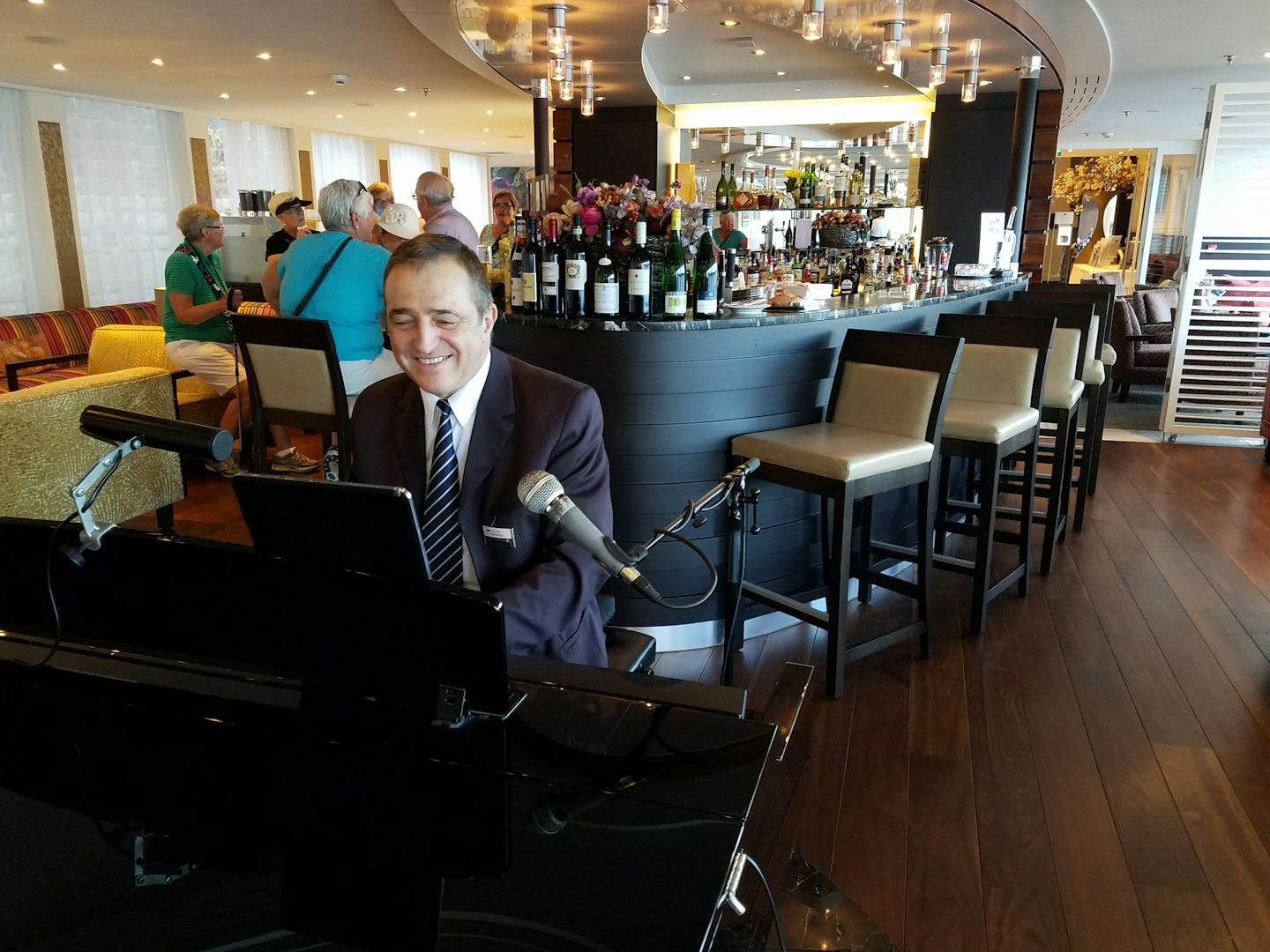On-board pianist/singer who gave music several times during day and evening