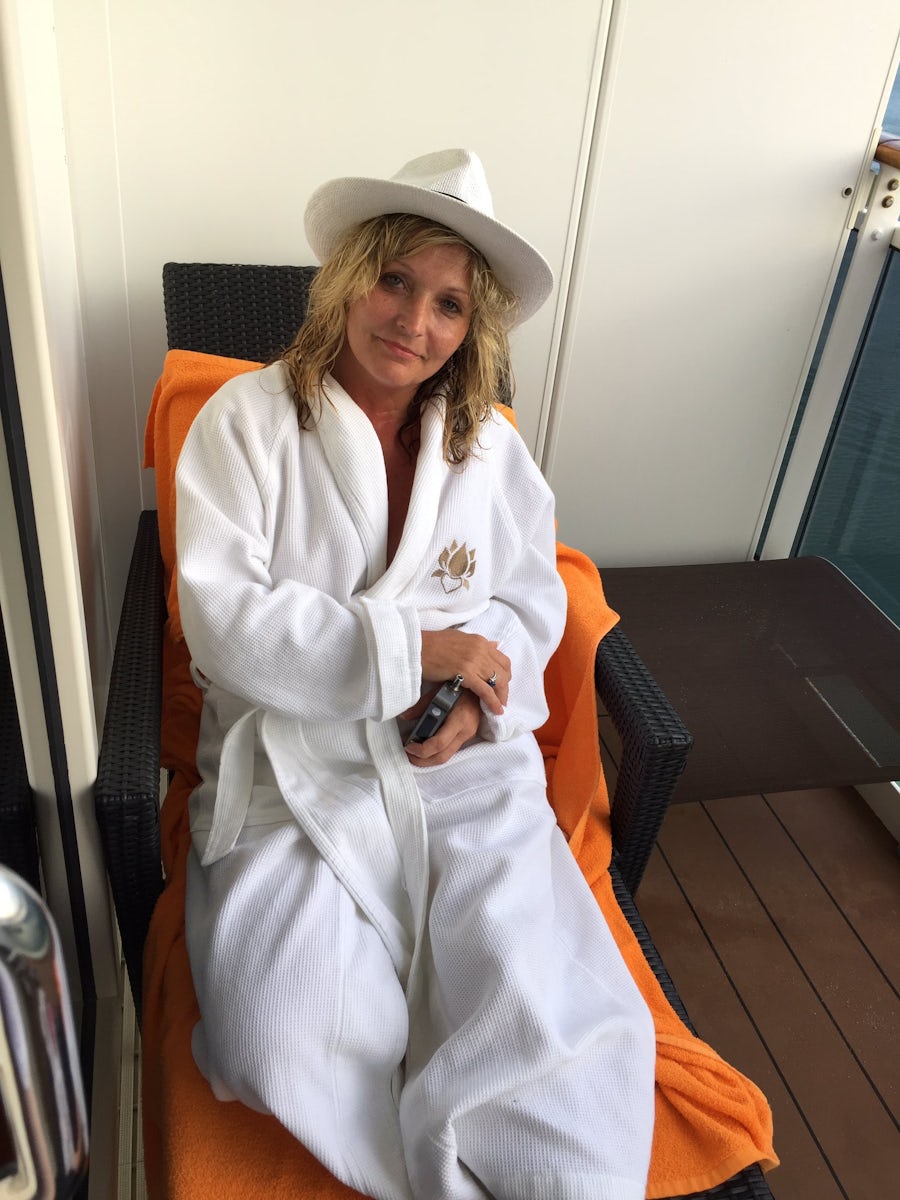 Relaxing on my comfy lounge chair on my balcony with my complimentary MSC R