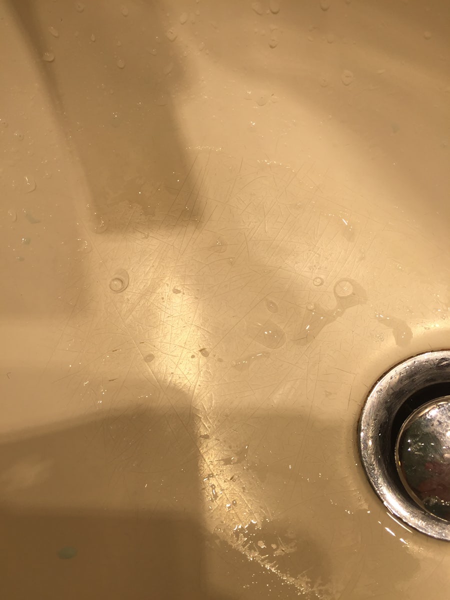 Scratched, cracked stateroom bathroom sink.