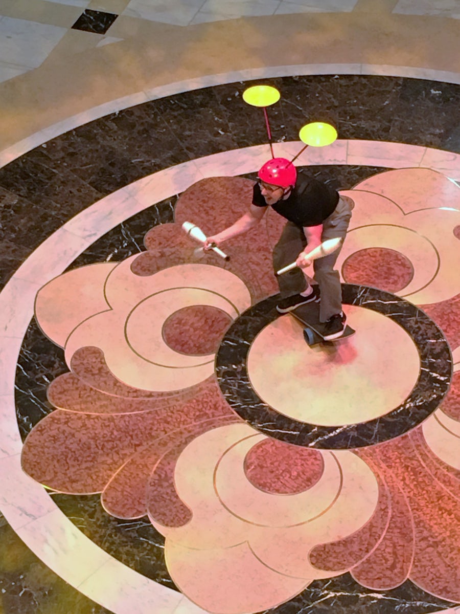 Funny and entertaining juggler in  the piazza
