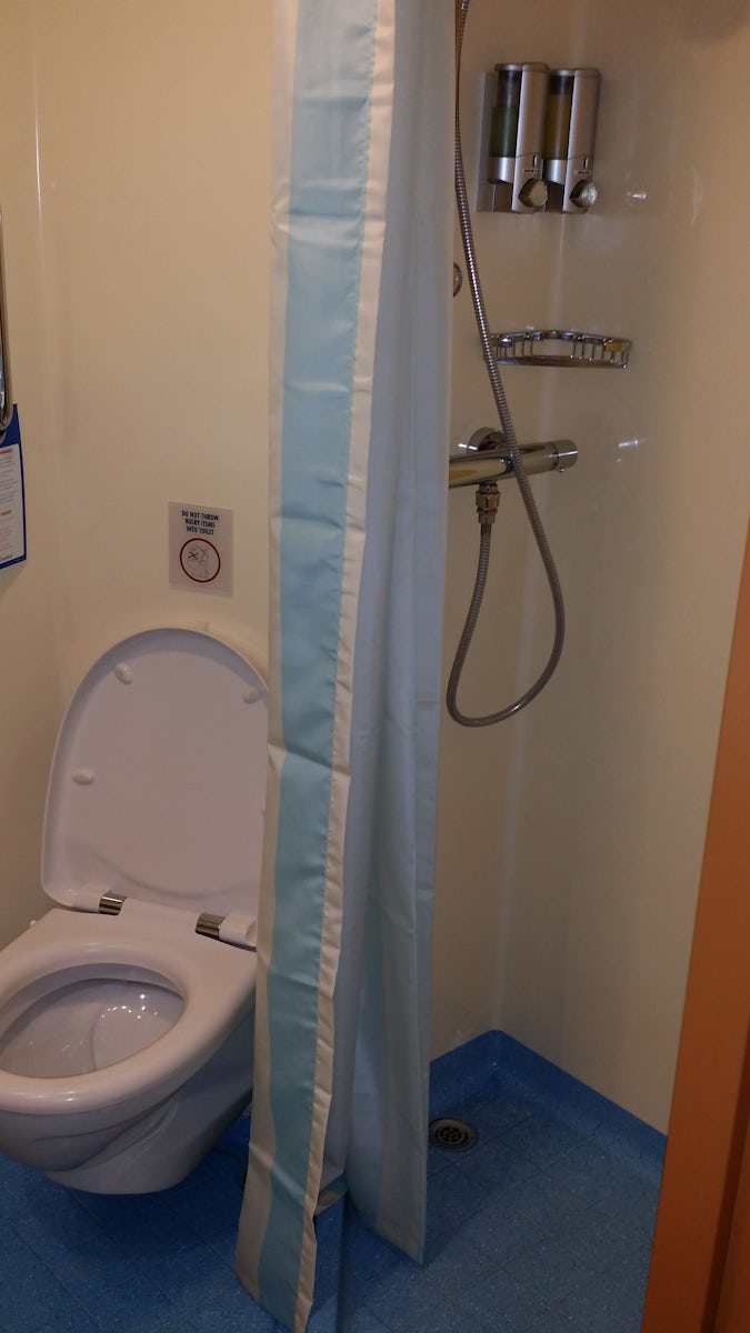 Big bathroom with shower and stool