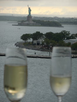 Enjoying Champagne travel toasts as Queen Mary 2 pauses in front of Lady Li