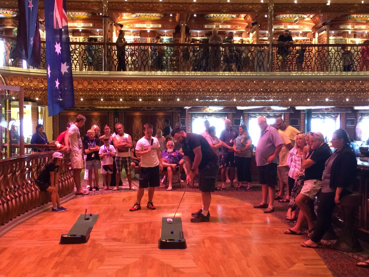 Atrium bar/lounge at the centre of the ship while a putting competition was