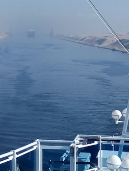 Sailing the Suez Canal in a convoy of nine ships