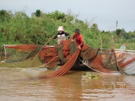 Fishing on the Mekong River.