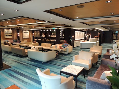 NCL Escape Haven lounge and bar area.