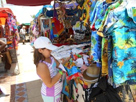 Diana haggling for a twin doll at the Marigot market.