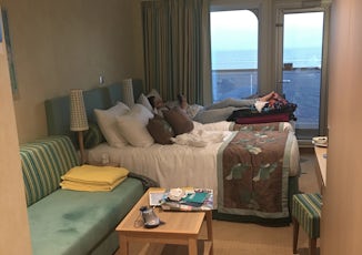 Our Stateroom. The spot on the couch is just water from a swimsuit. Wish I