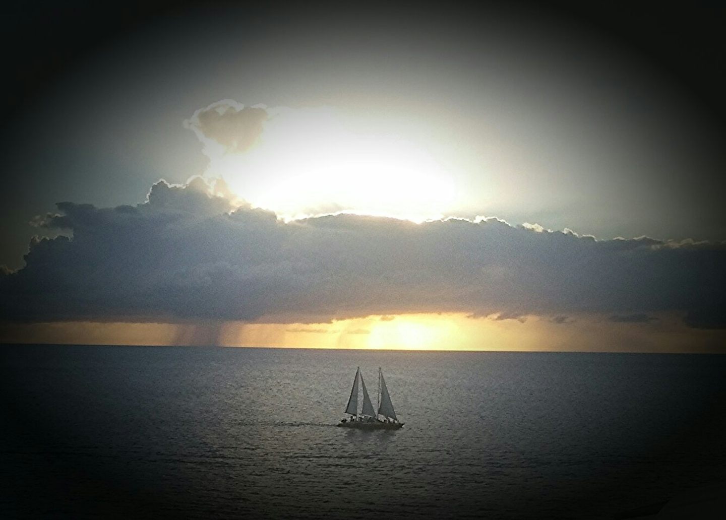 This is a sailboat at sunset taken from our sunset veranda.
