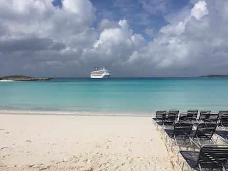 This picture is from Half Moon Cay. Crystal Blue sea with nice partly sunny.