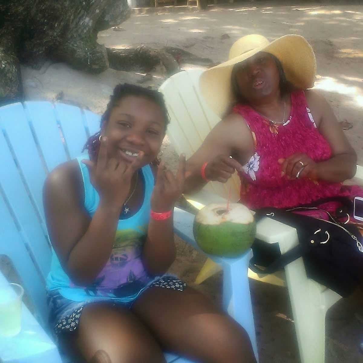 My mom and Niece enjoying themselves on the beach in Jamaica