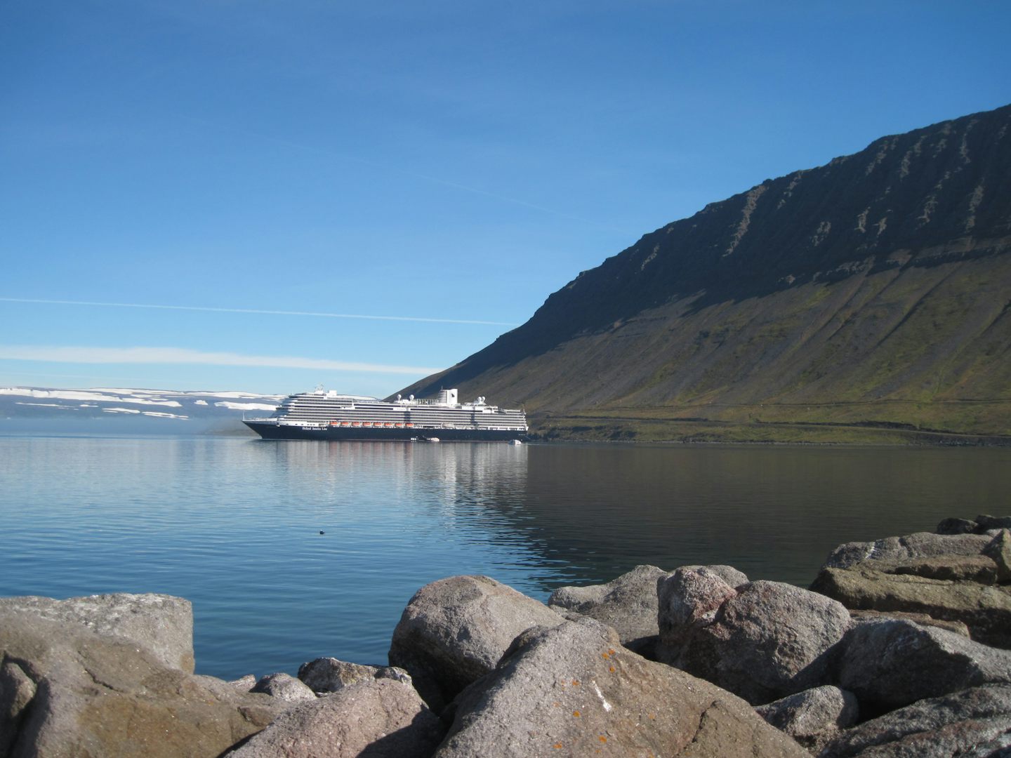 When we arrived at Isafjordur, Iceland on the Koningsdam, the fog was thick. Then, magically, it melted away to show us the gorgeous bowl of treeless green hills that formed the harbour.