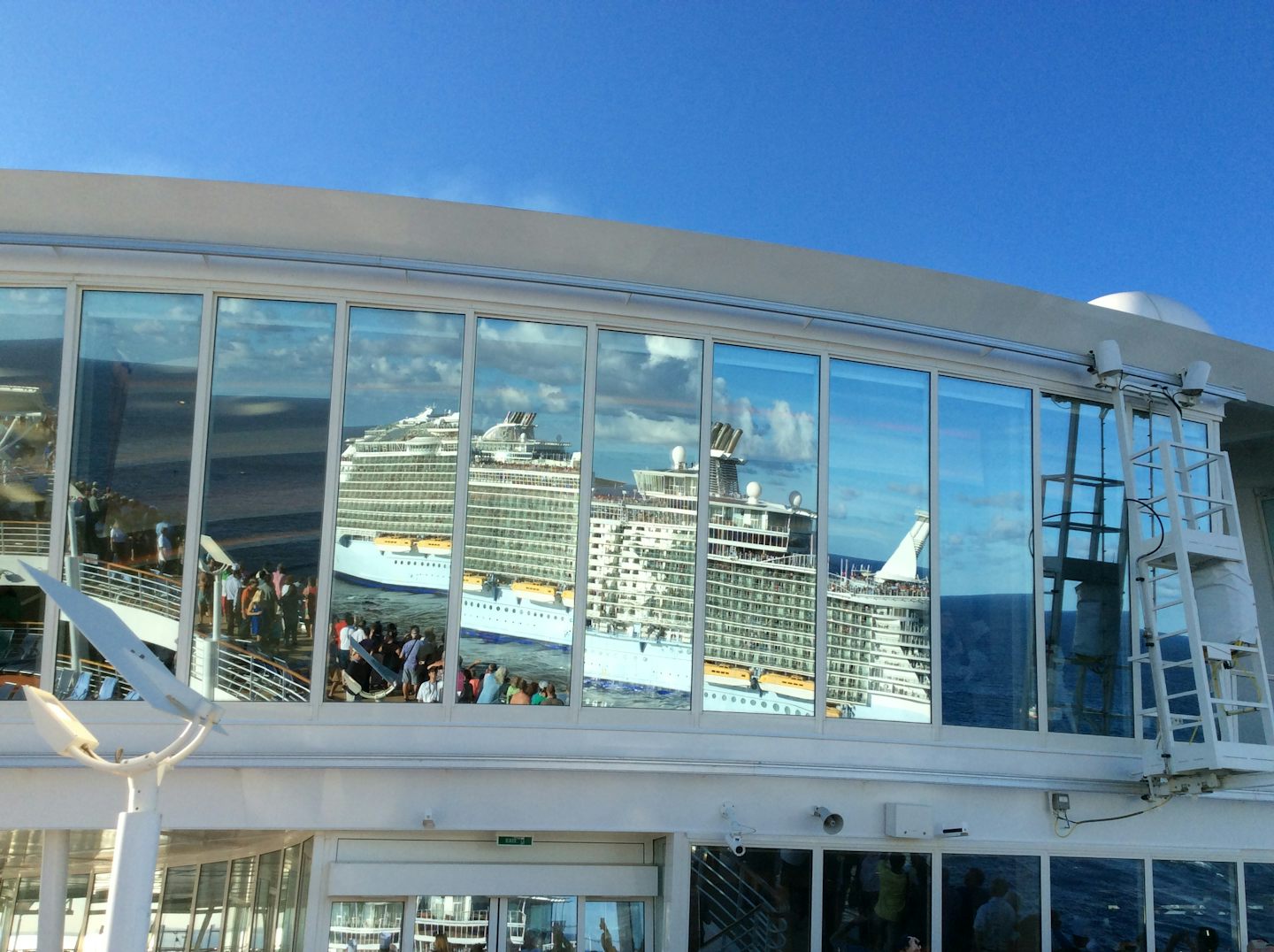 Meeting of Allure, Oasis, and Harmony outside of Fort Lauderdale as reflected in the top of the Harmony