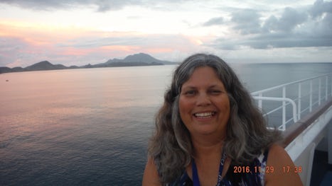 A hot sexy mama selfie of me with the sun set in the background in front of the virgin islands.