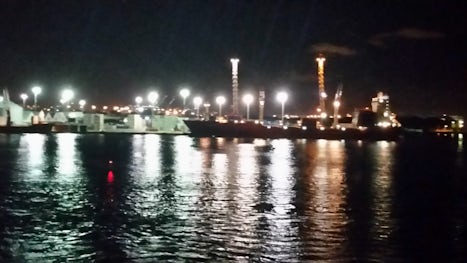 Night time turns oil refineries to something magical. This was taken from Promenade Deck (deck 3) on Nieuw Amsterdam.