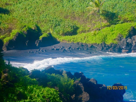 Black sand beach on The Road to Hana on the island of Maui. Rented a car and drove the 64 miles with 617 hairpin curves and 59 one lane bridges.
