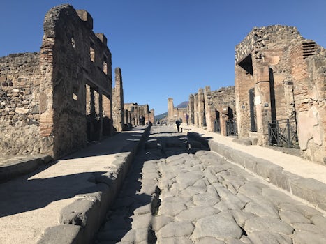 Pompeii street - note the wear from the cart wheels. Consider how many years that must have taken.....