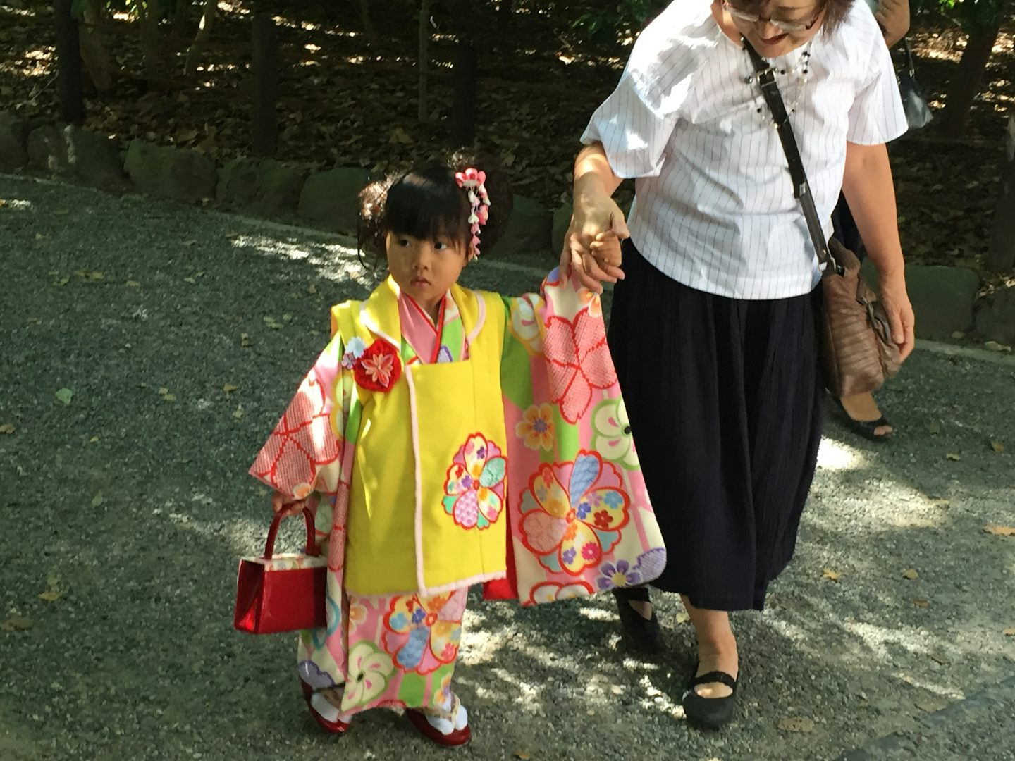 In Japan, children are not considered "human" until they are at least 8 or 9. To remind the gods that they are there, moms and grandmas bring them to the Shinto Shrine to ask for their blessing.