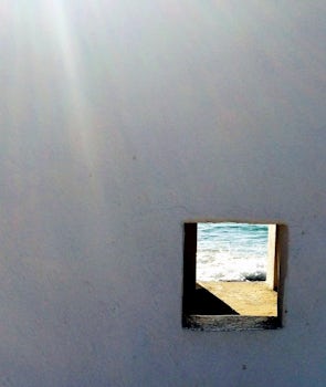 View through one of the slave huts on Bonaire.
