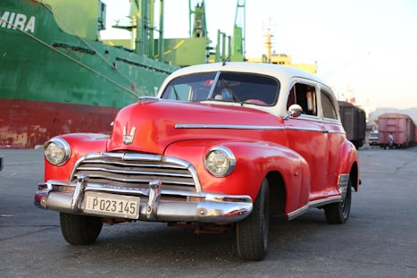 Vintage car waiting at the port of Cienfuegos, Cuba
