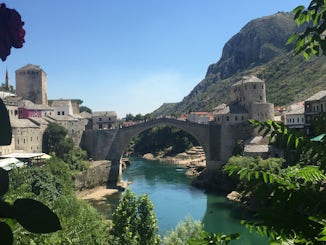 Old bridge in Mostar, Bosnia-Herzegovina seen on an all-day private tour by car with guide. Doable due to extended evening stay in port of Dubrovnik in Croatia.