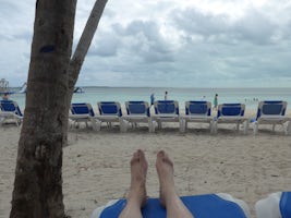 Sitting on the beach on Coco Cay