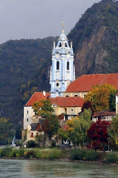 Idyllic Church on the shore of the Danube River