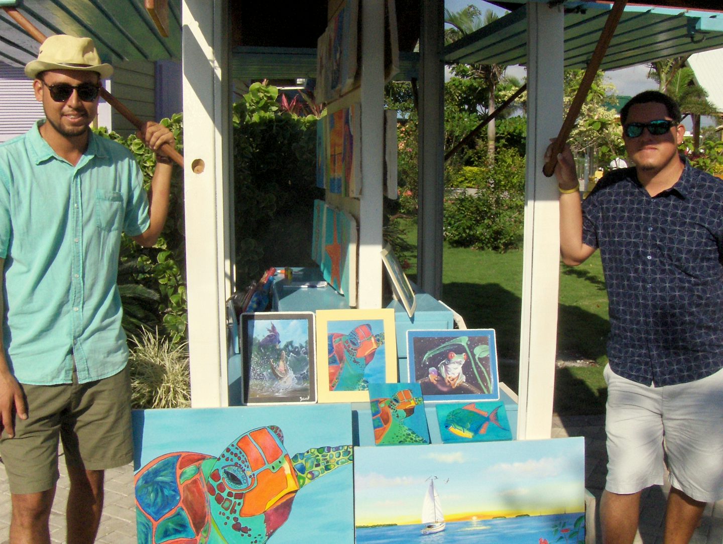 Two Artists displaying their beautiful Art work at Harvest Caye